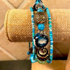 Multi assorted bead coil bracelet.